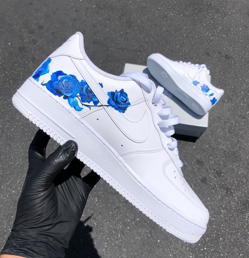 Blue hot sale white nikes